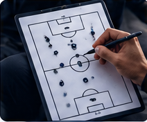 Coach drawing a soccer session plan